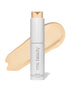 ReEvolve Natural Finish Liquid Foundation bottle with creamy beige foundation swatch behind, showcasing smooth texture and natural coverage for clean beauty makeup.
