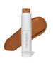 ReEvolve Natural Finish Liquid Foundation by rms beauty in a medium tan shade, shown with a smooth foundation swatch to highlight its natural, clean beauty formulation.