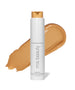 ReEvolve Natural Finish Liquid Foundation bottle with a smooth, medium beige liquid foundation swatch behind it, showcasing a natural and clean beauty makeup option.
