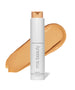 ReEvolve Natural Finish Liquid Foundation in a sleek white bottle with beige liquid foundation swatch behind, featuring clean beauty and sustainable packaging.