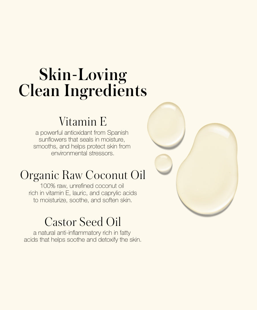 Close-up of clear liquid droplets on a light background with text describing clean ingredients including Vitamin E, organic raw coconut oil, and castor seed oil in Luminizer skincare infused makeup.