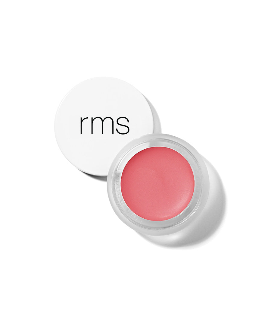 Open jar of pink cream blush makeup with white lid featuring rms logo, showcasing Lip2Cheek product for natural, clean beauty and skincare infused makeup.