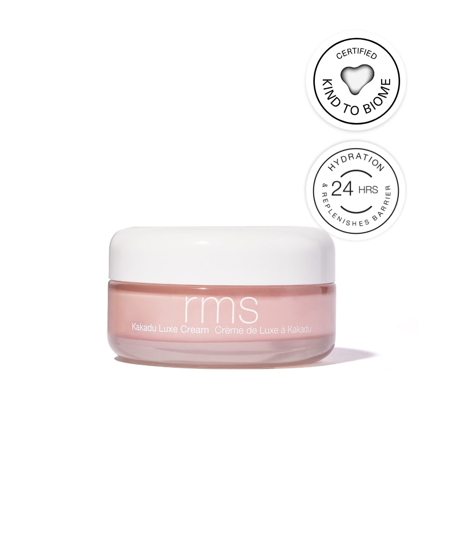 Kakadu Luxe Cream in a small clear jar with a white lid, featuring hydration claims of 24 hours and certified kind to biome for clean beauty skincare.