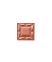 Close-up of a square ReDimension Hydra Powder Blush in a warm terracotta shade with a geometric embossed design and "rms" lettering, highlighting natural and clean beauty makeup.