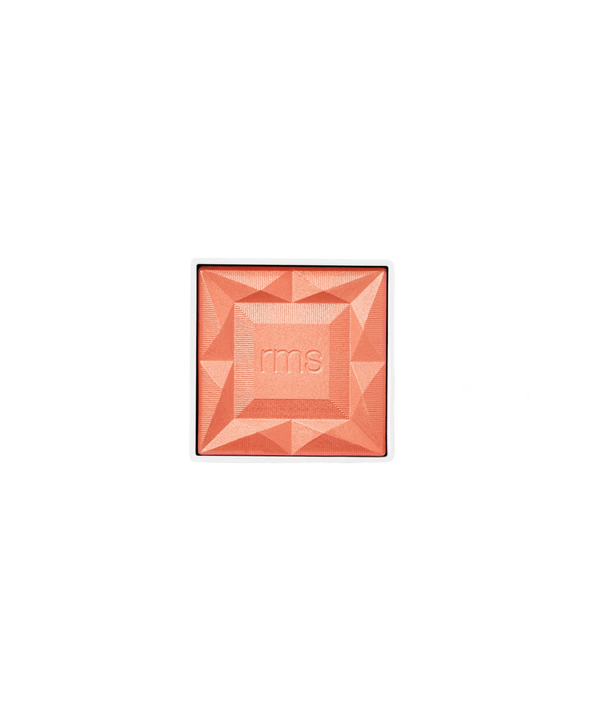 Square coral blush powder with a geometric embossed design and RMS logo in the center, representing ReDimension Hydra Powder Blush makeup with clean beauty and cruelty free skincare qualities.