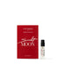 Small sample vial of RMS x Heretic: Scarlet Moon Fragrance with elegant red packaging, highlighting clean beauty and natural ingredients in a cruelty-free scent.