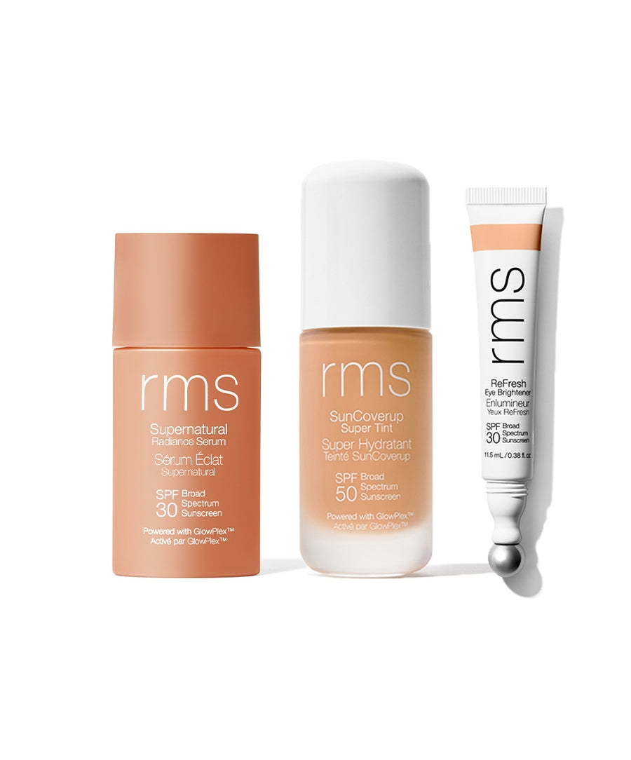 The Complete SPF Set featuring three skincare products in beige and white packaging, including sunscreen with SPF 30 and SPF 50 for natural, clean beauty and sustainable skincare.