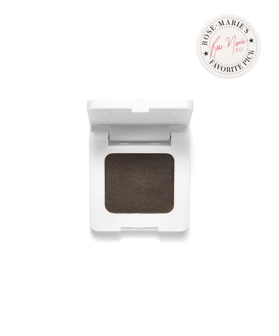 Open compact of Back2Brow Powder in a deep brown shade with a clean white case, featuring a badge indicating it as a favorite pick by Rose-Marie.