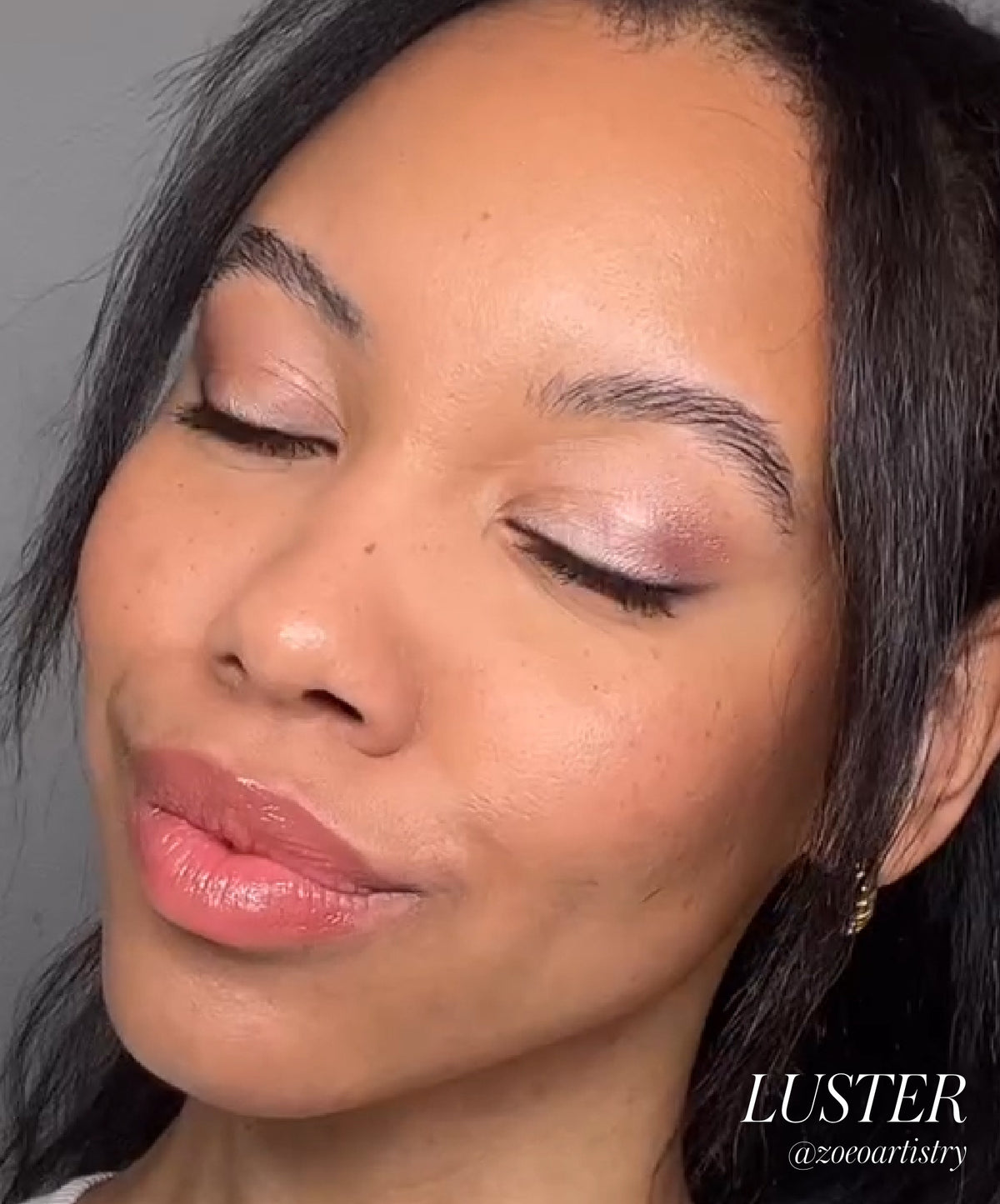 Close-up of a woman with smooth skin wearing Eyelights Cream Eyeshadow in a soft, shimmery luster shade, showcasing clean beauty and natural ingredients for a subtle glow.