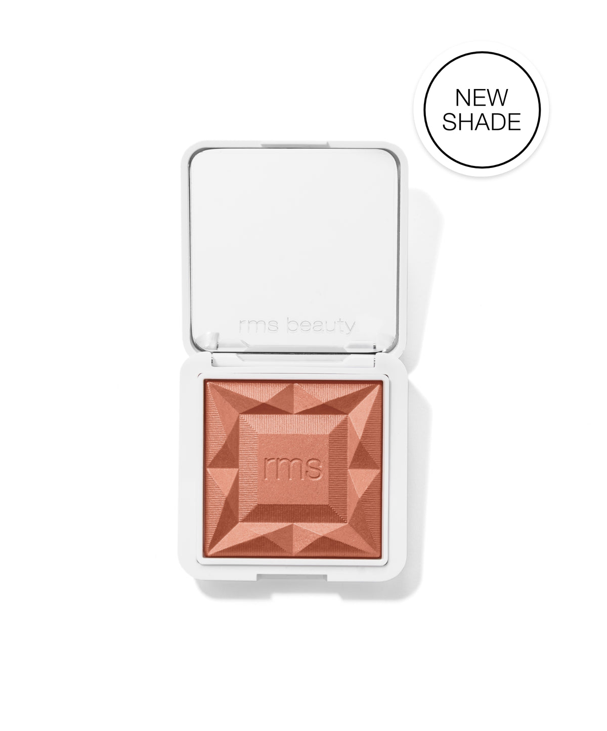 ReDimension Hydra Powder Blush in new shade with a geometric embossed design, presented in a clean white compact, featuring a warm coral tone for natural, radiant color.