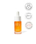 A small glass dropper bottle of Kakadu Beauty Oil with vibrant orange liquid, featuring labels for hydration, certified kind to biome, and a favorite pick badge against a white background.