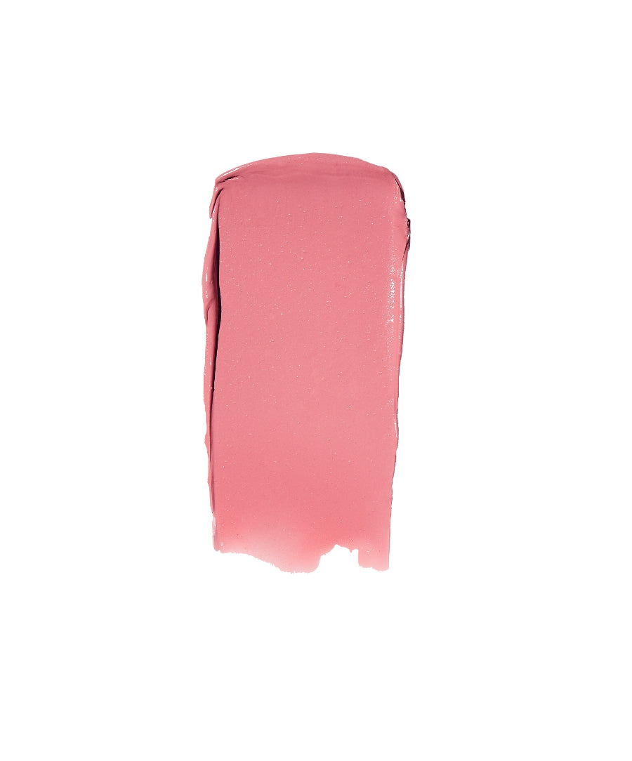 Smooth swatch of pink cream makeup product Lip2Cheek showcasing its blendable texture and natural finish for cheeks and lips.