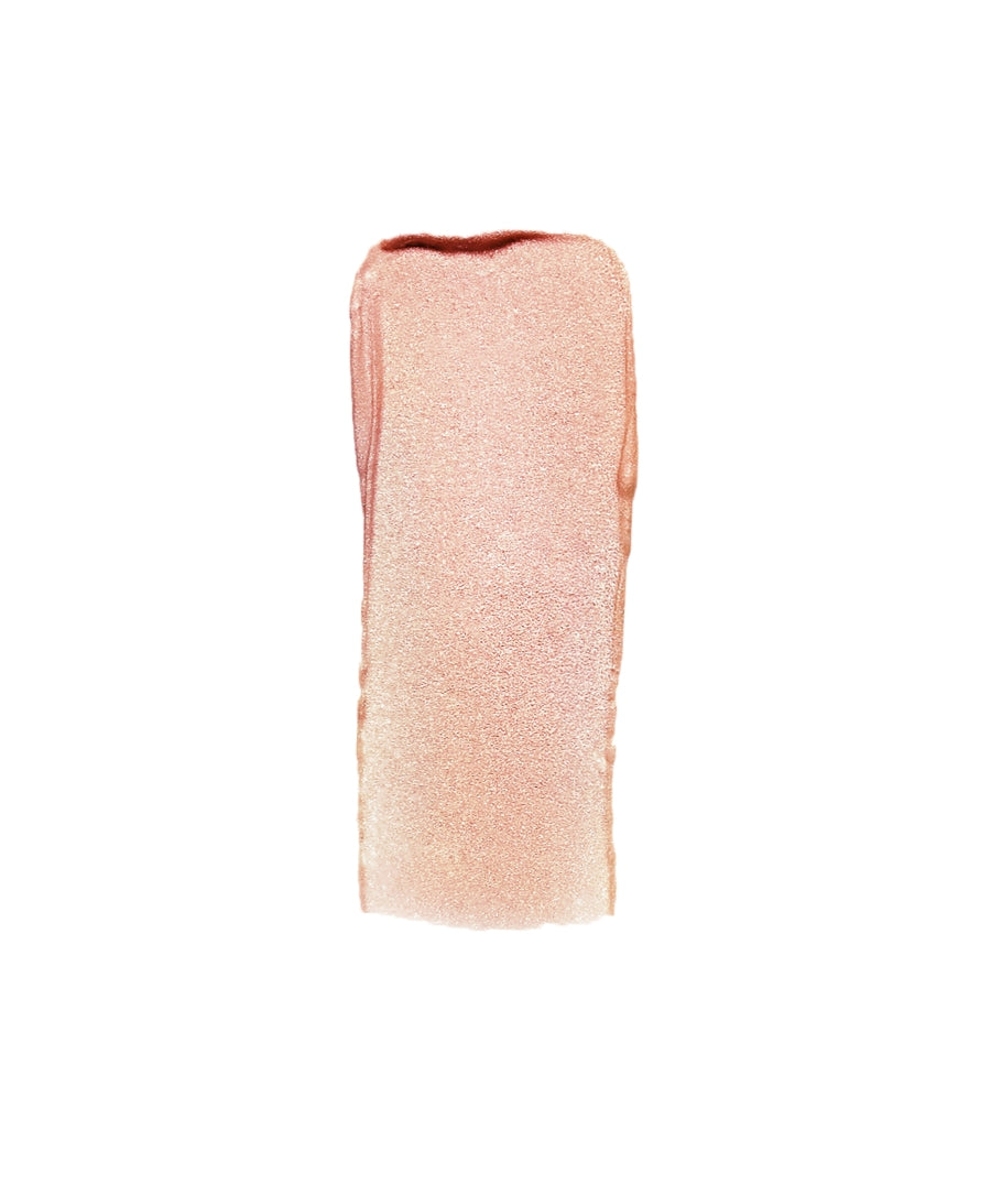 Luminizer swatch in a soft champagne rose shade, showcasing a luminous, radiant finish ideal for enhancing natural beauty with clean, cruelty free makeup.