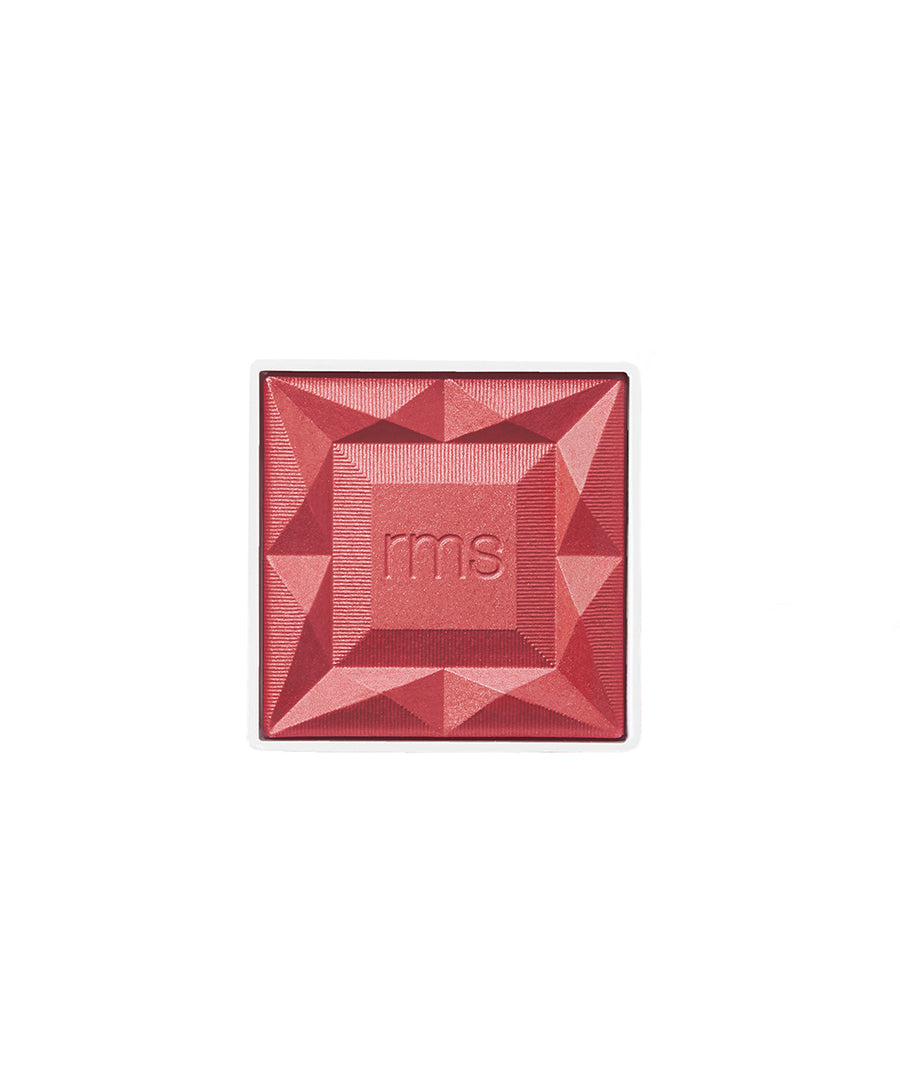 ReDimension Hydra Powder Blush in a rich, rosy shade featuring a geometric embossed design with the rms logo, highlighting clean beauty and cruelty-free makeup qualities.