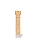 Refill tube of ReEvolve Natural Finish Liquid Foundation by RMS Beauty in a warm beige shade with clean, sustainable packaging designed for cruelty free makeup.