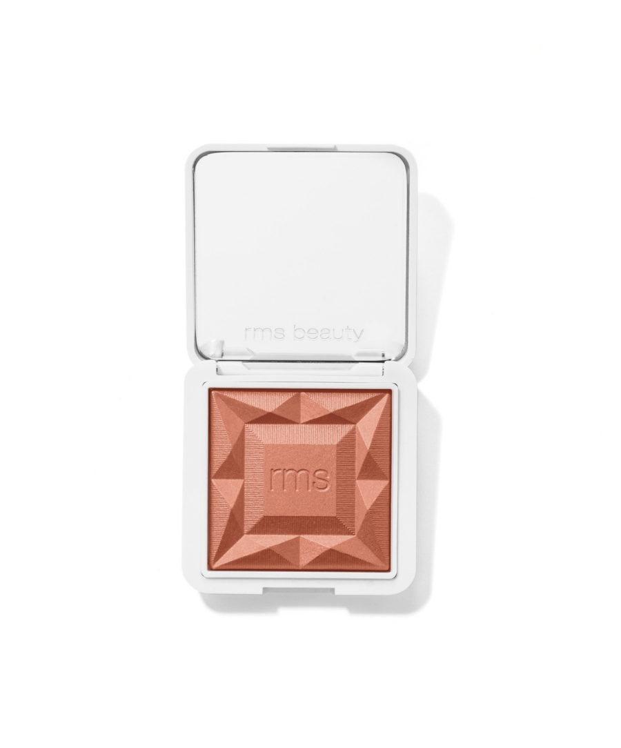 Compact with a geometric patterned powder blush in a warm terracotta shade embossed with "rms," featuring clean beauty with natural ingredients in the ReDimension Hydra Powder Blush.