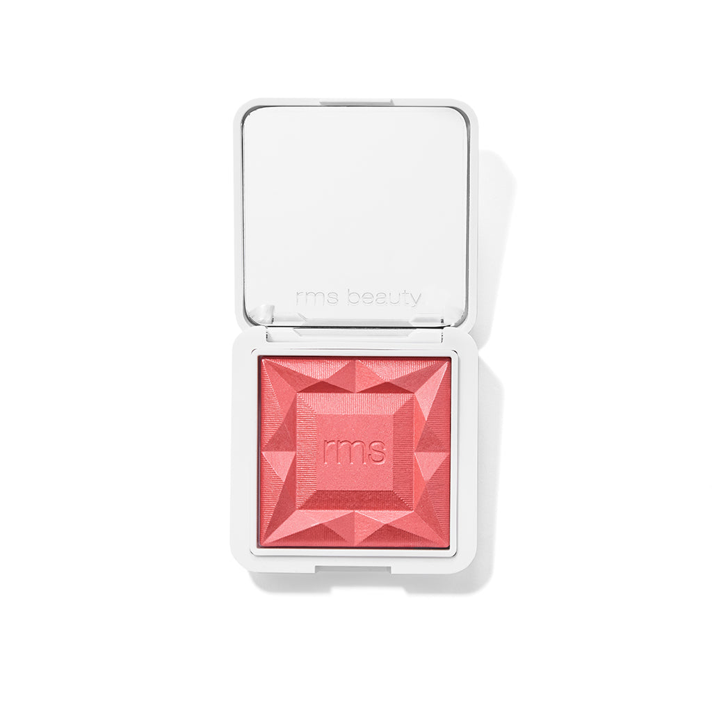 Open compact of ReDimension Hydra Powder Blush in a vibrant pink shade with geometric embossed design, featuring clean beauty and natural ingredients.