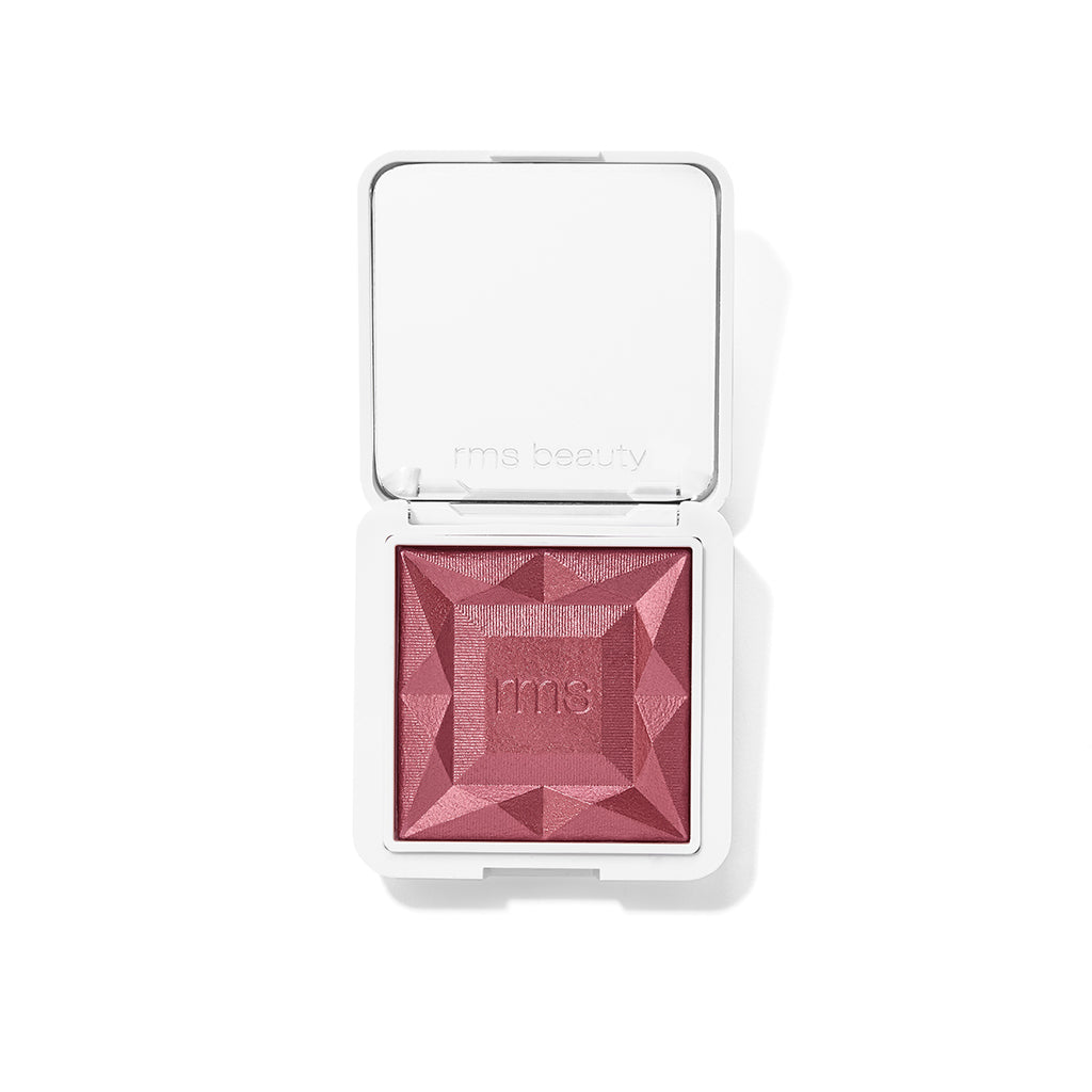 Compact ReDimension Hydra Powder Blush with a faceted, jewel-like deep rose shade in sleek white recyclable packaging, featuring clean beauty and natural ingredients.
