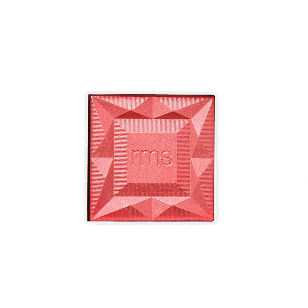 ReDimension Hydra Powder Blush in a vibrant coral shade with a geometric embossed design and natural ingredients for a radiant, clean beauty look.