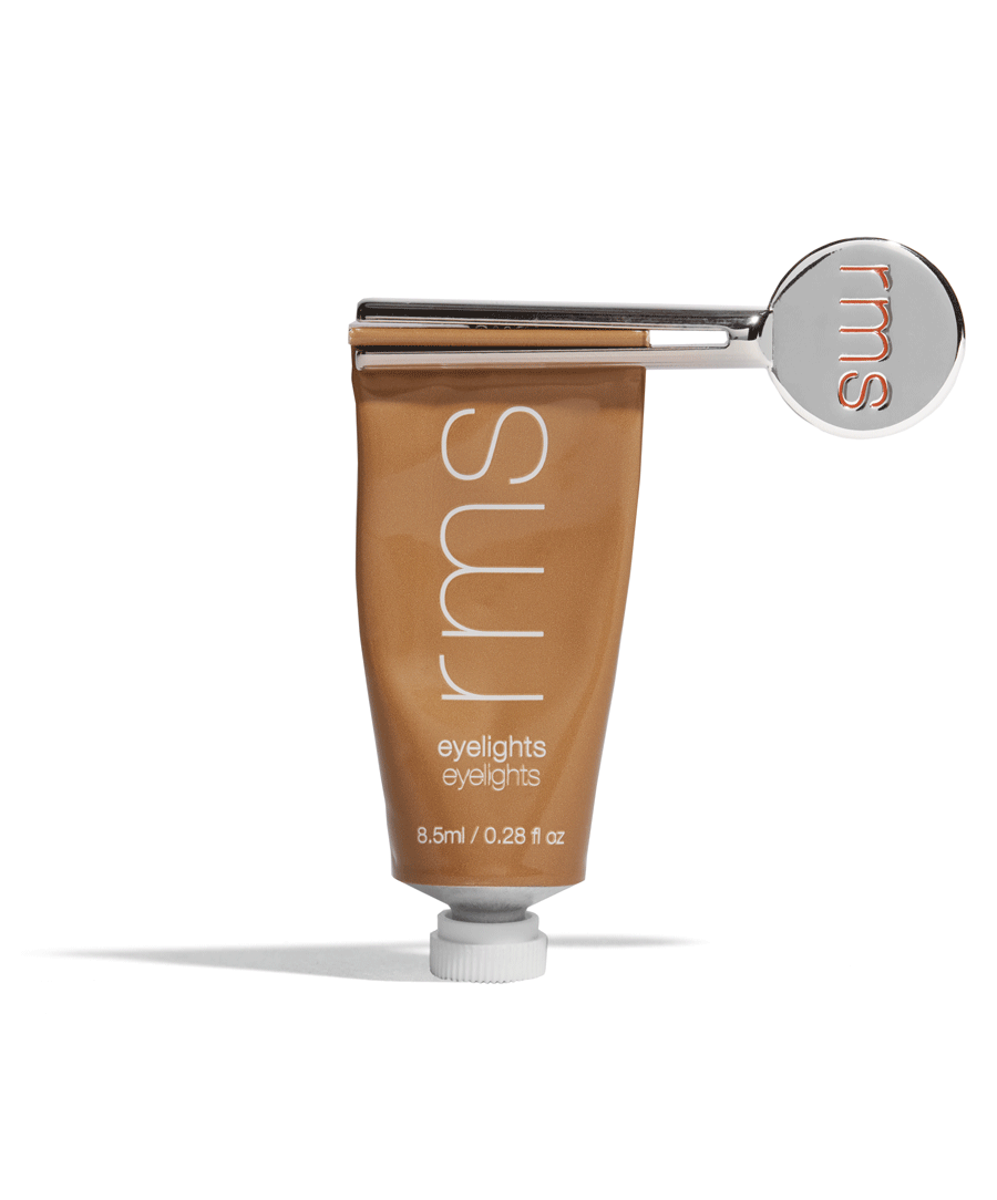 GIF of RMS Reusable Metal Tube Key  twisting slowly to dispense Eyelights Cream Eyeshadow