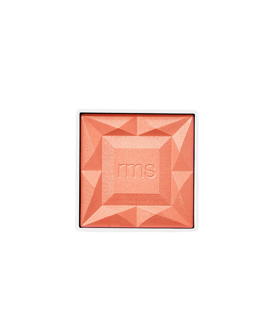 ReDimension Hydra Powder Blush in a coral shade with a geometric embossed design and rms logo, featuring clean beauty ingredients and sustainable packaging.