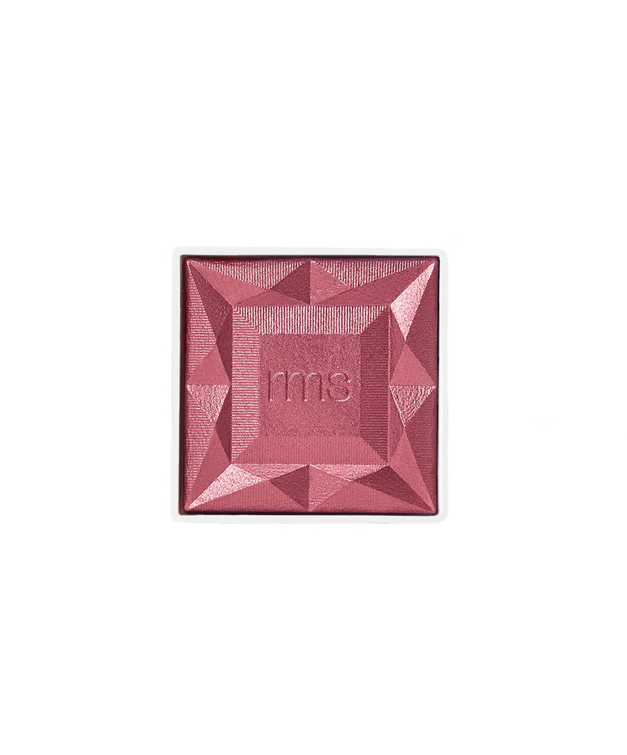 ReDimension Hydra Powder Blush in a deep rose shade with a textured, geometric pressed powder surface embossed with "rms," highlighting clean beauty and natural ingredients.
