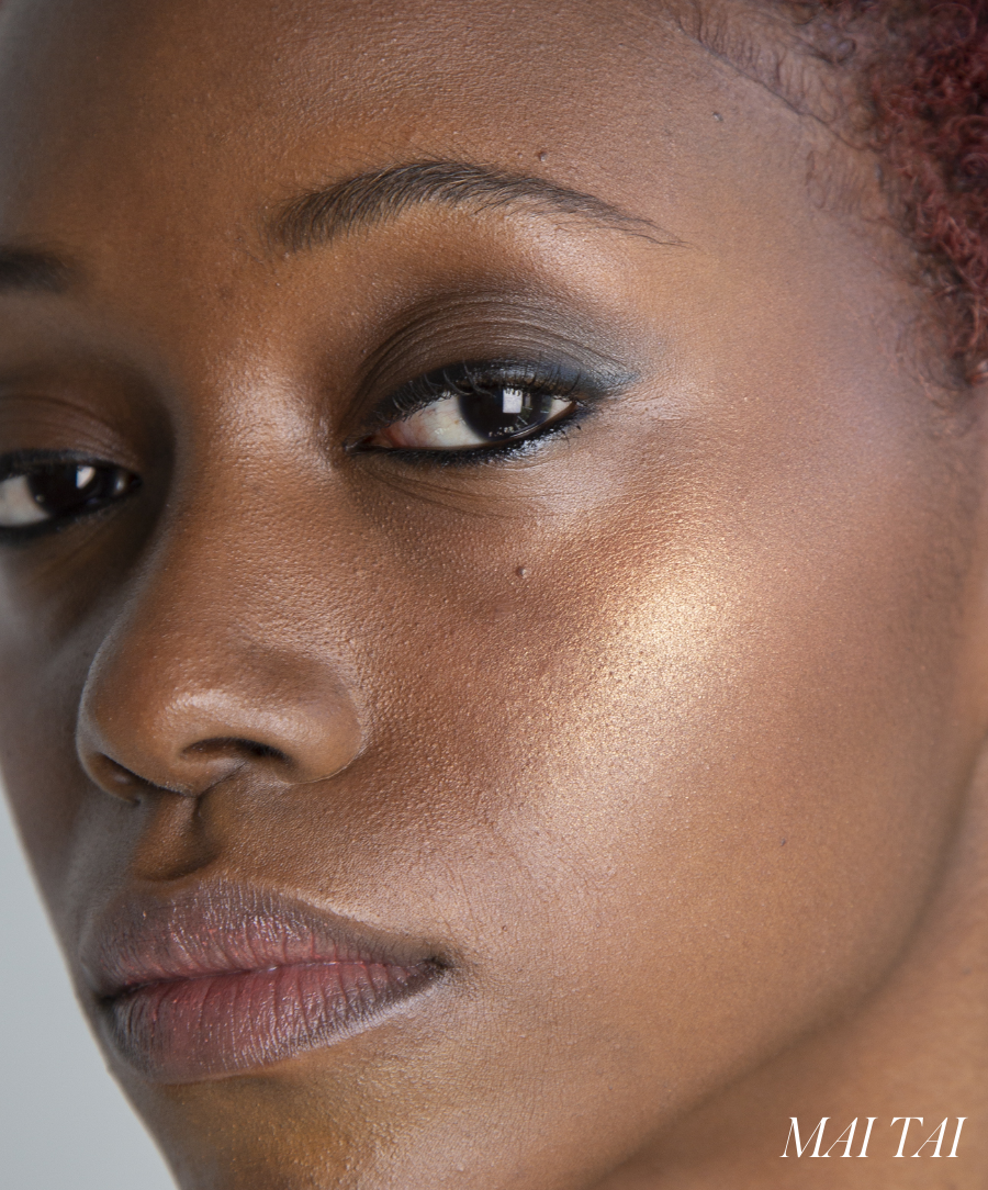 Close-up of a person with smooth, glowing skin wearing ReDimension Hydra Powder Blush in a natural, radiant finish, highlighting clean beauty and skincare infused makeup.