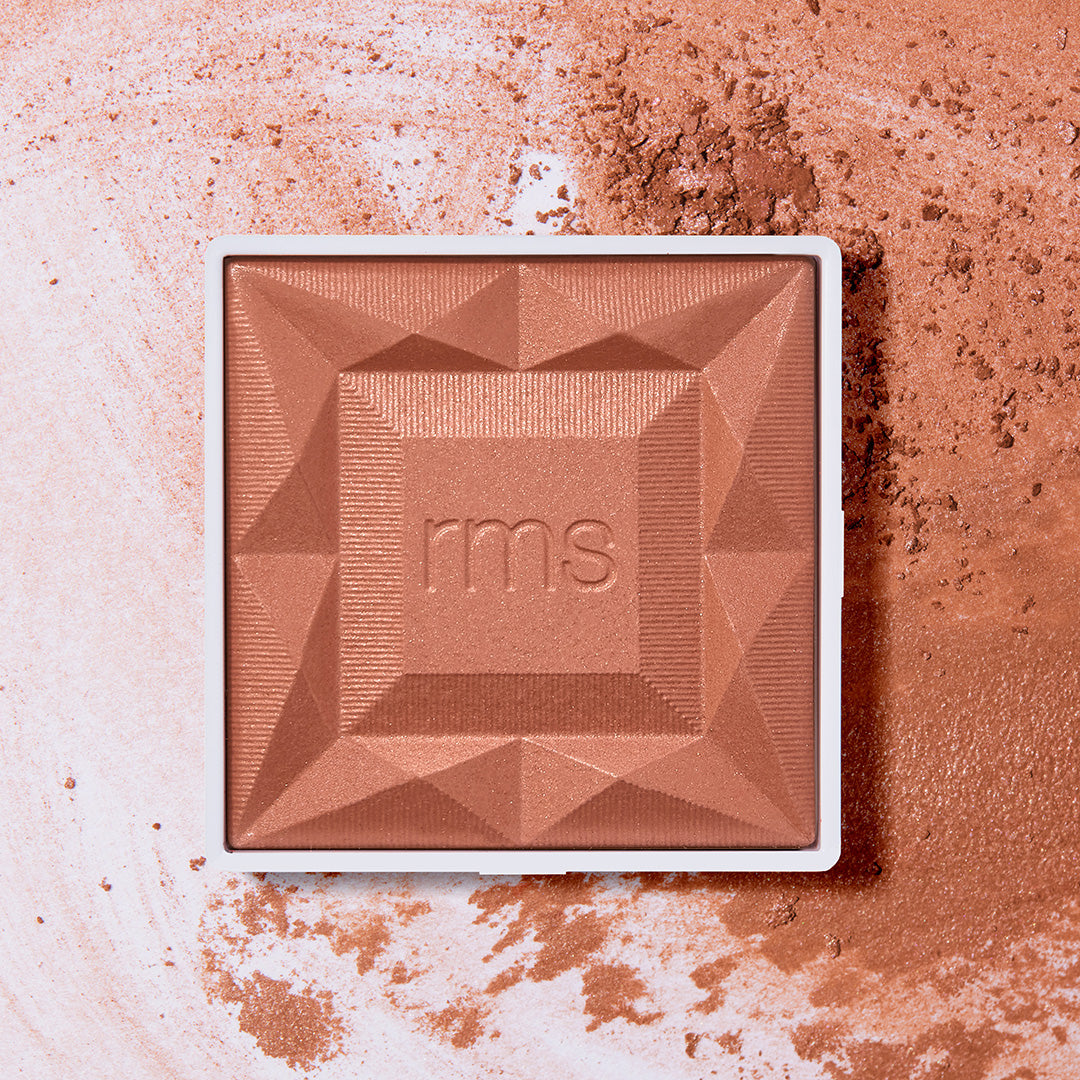 ReDimension Hydra Powder Blush in a warm, earthy tone with a geometric embossed design, featuring clean beauty ingredients and sustainable packaging from RMS Beauty.